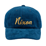 Nixon Capitol Cap Navy/Gold. Foto da parte da frente.